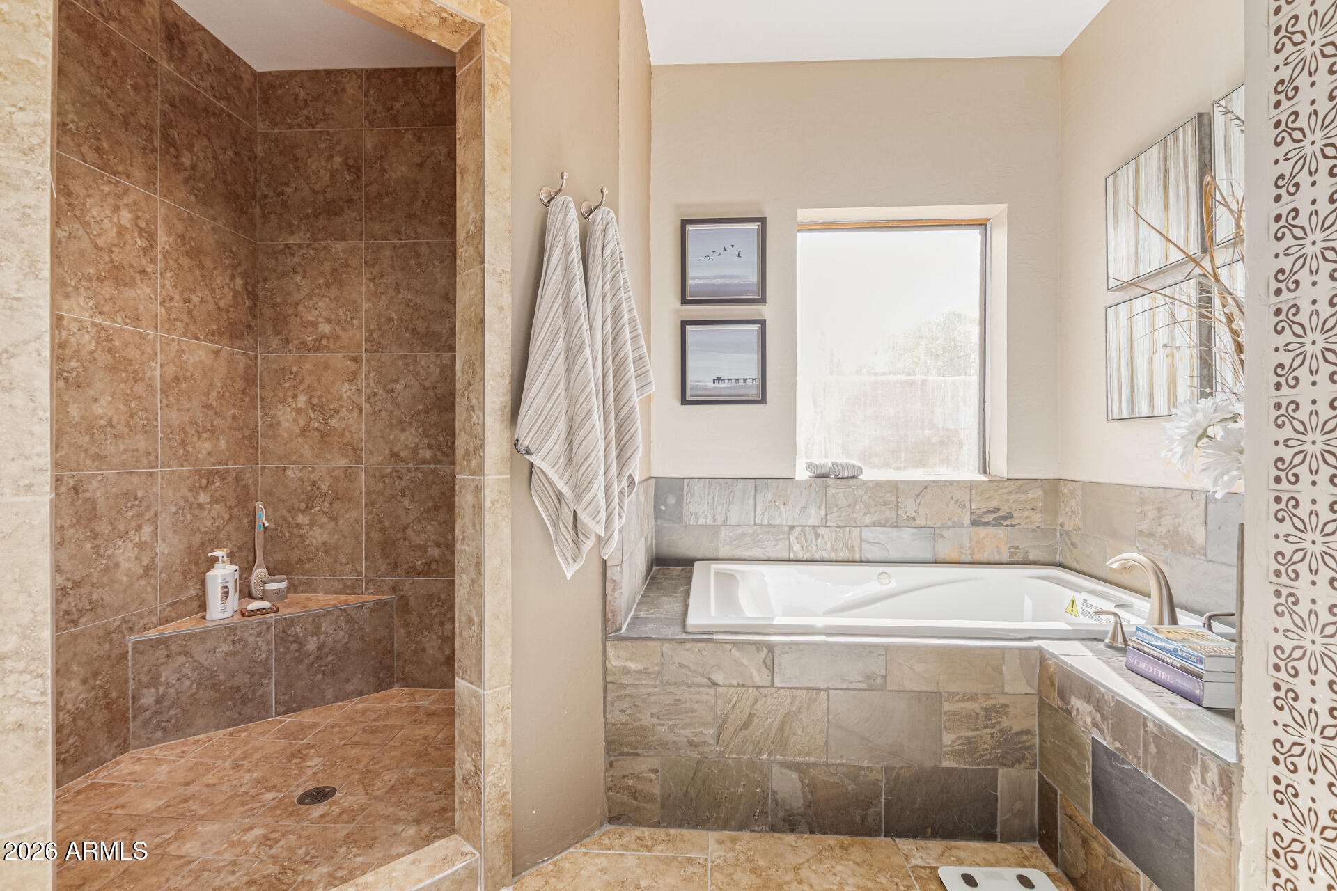 1932 East Beck Lane Phoenix, AZ 85022 - Photo 25 of 52 a bathroom with a bathtub and shower