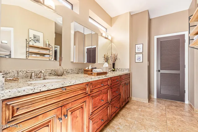 a view of a swimming pool with outdoor seating