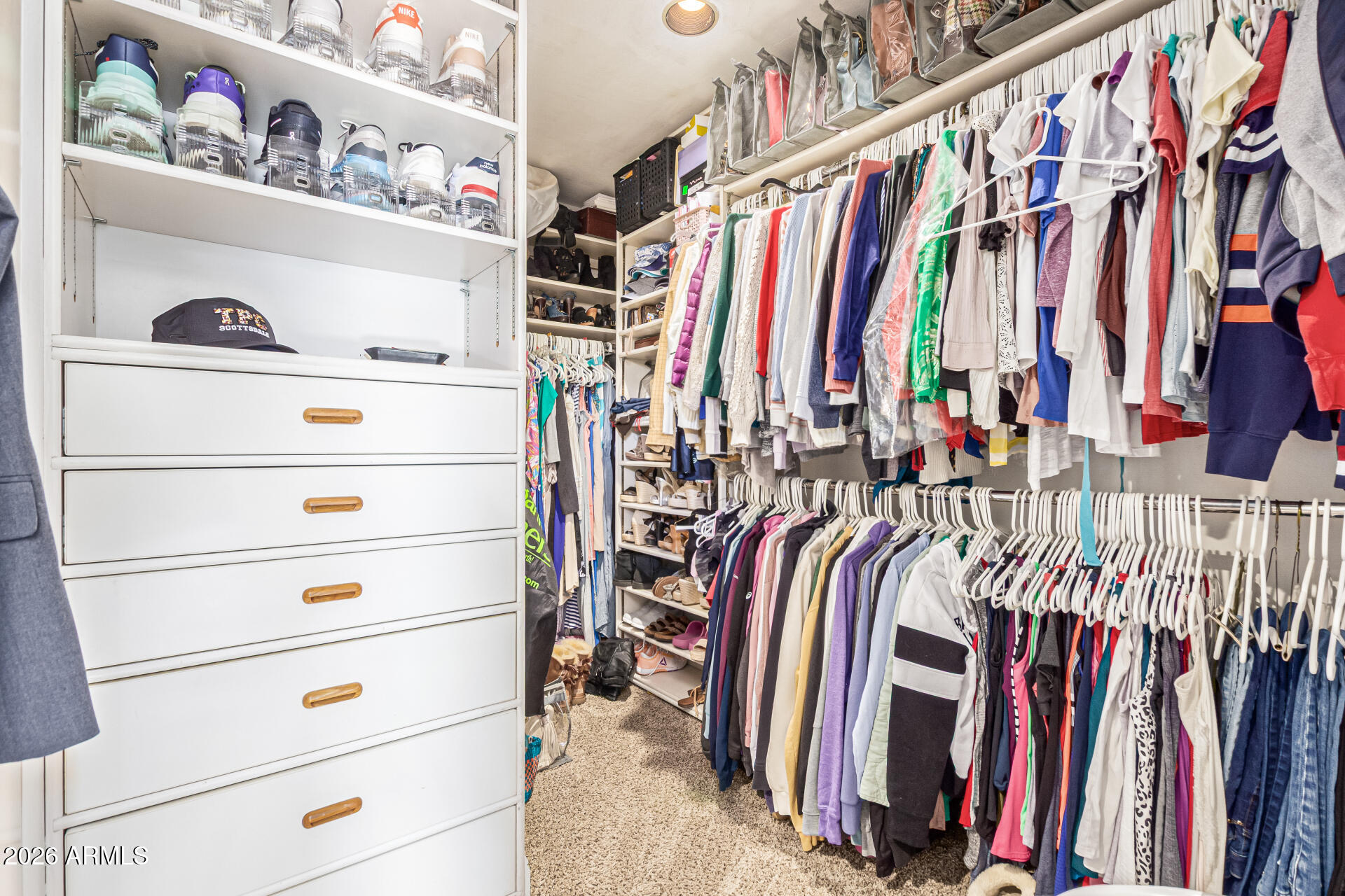 1932 East Beck Lane Phoenix, AZ 85022 - Photo 27 of 52 a view of walk in closet with clothes and shoes