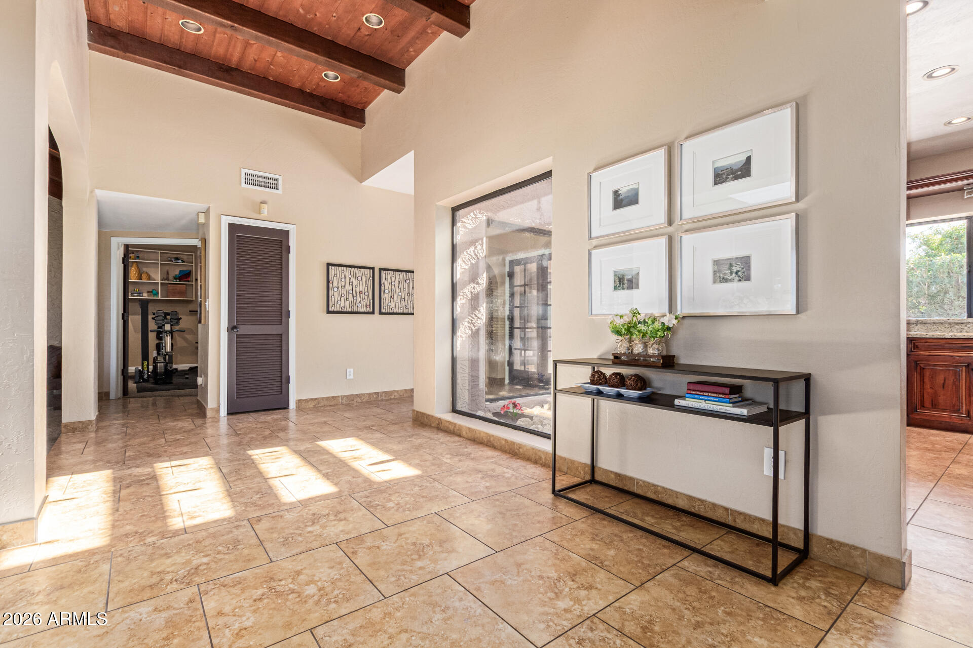 1932 East Beck Lane Phoenix, AZ 85022 - Photo 7 of 52 a kitchen with stainless steel appliances granite countertop a refrigerator and a stove