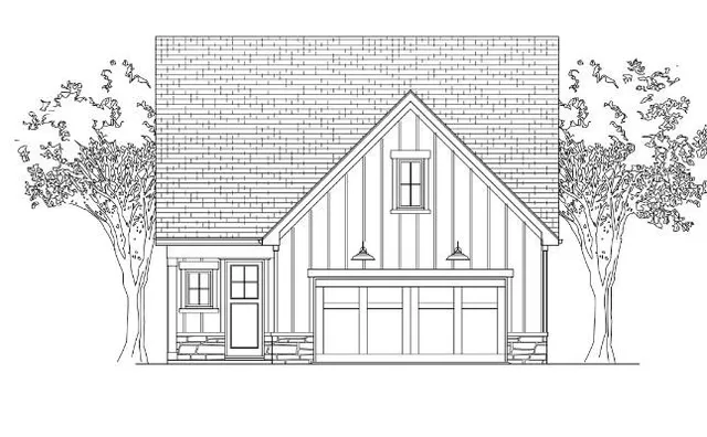 a black and white photo of a house