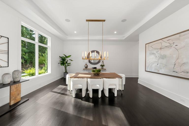 5211 Powers Ferry Road Northwest Sandy Springs, GA 30327 - Photo 35 of 106 a view of a dining room with furniture window and outside view