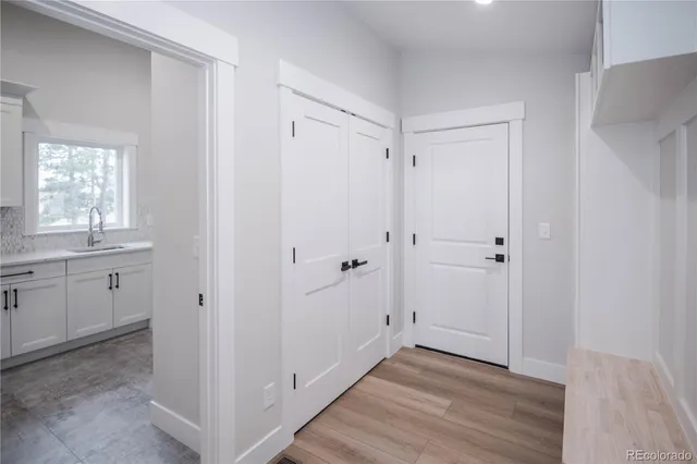a view of a bathroom with wooden floor