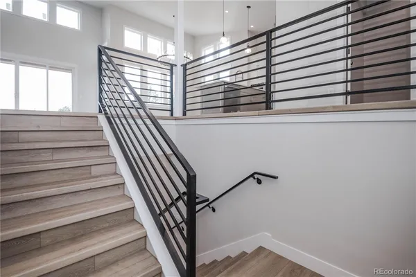 a view of entryway with wooden floor