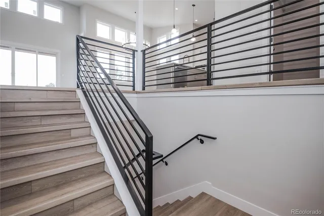 a view of entryway with wooden floor