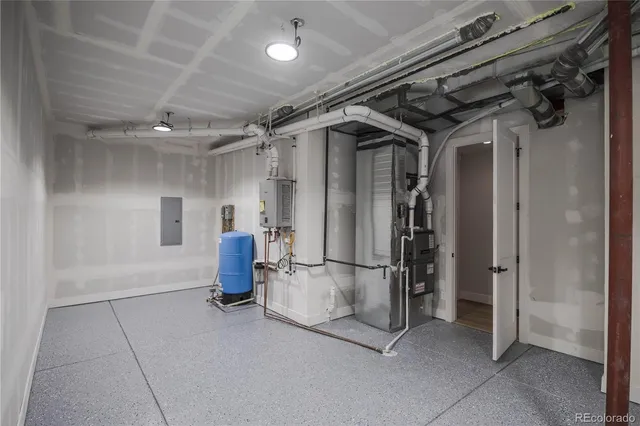 a view of a white house with large windows