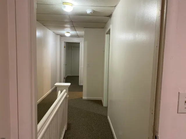 a view of hallway with stairs