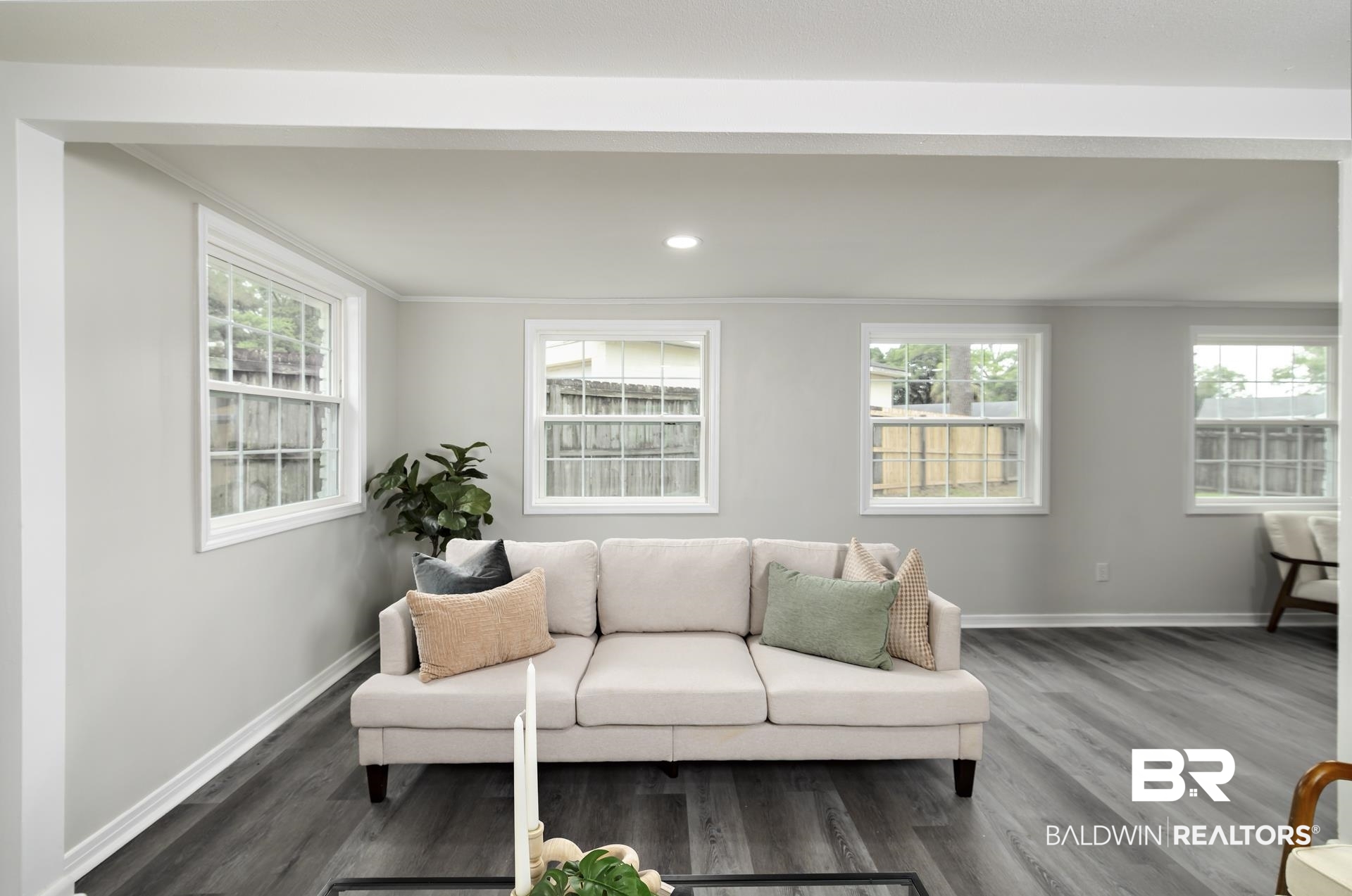 5922 Sunnyside Drive Mobile, AL 36619 - Photo 15 of 51 Living room with dark wood-style floors, baseboards, ornamental molding, healthy amount of natural light, and recessed lighting