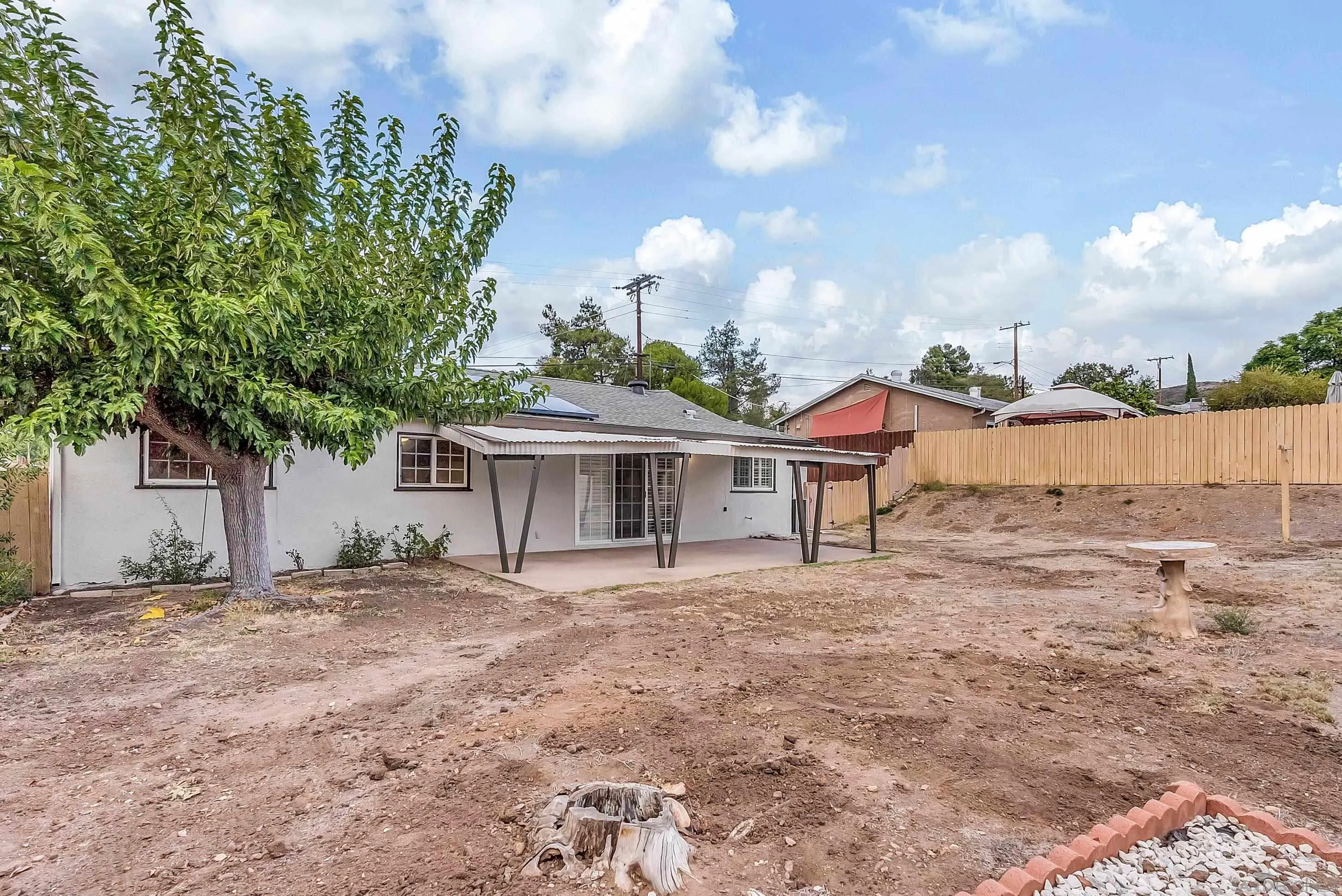 9215 Lake Canyon Road Santee, CA 92071 - Photo 15 of 18 front view of a house with a yard