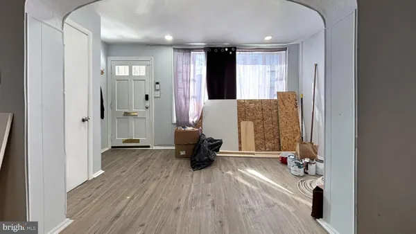a view of a livingroom with furniture and a window