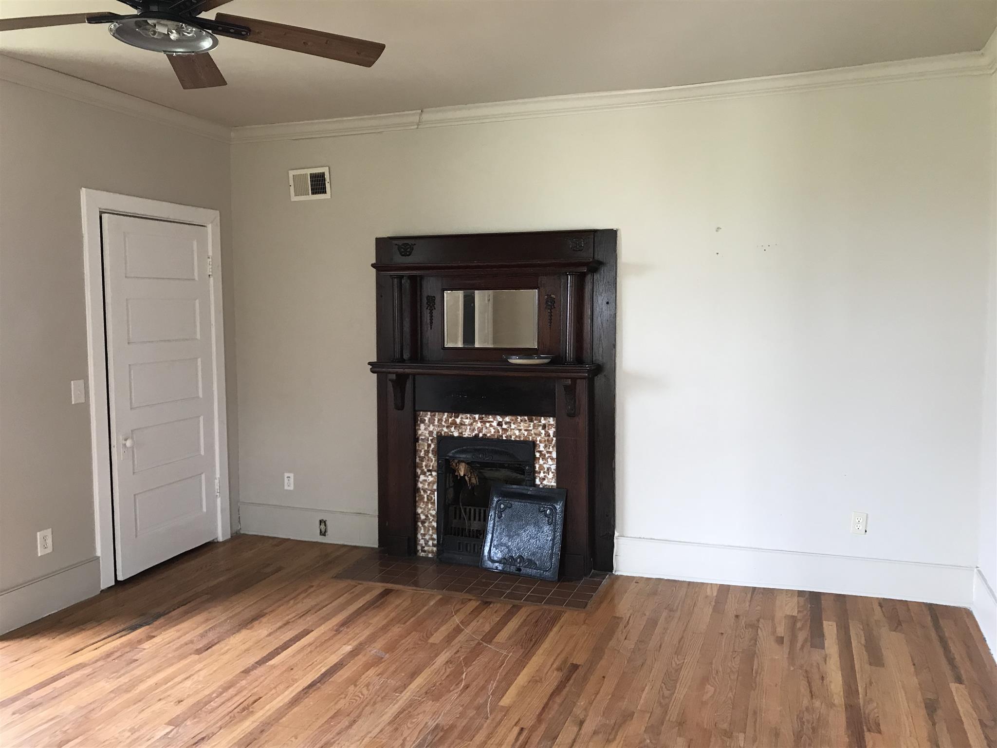 4337 Airport Road Springfield, TN 37172 - Photo 3 of 22 a view of an empty room with a fireplace