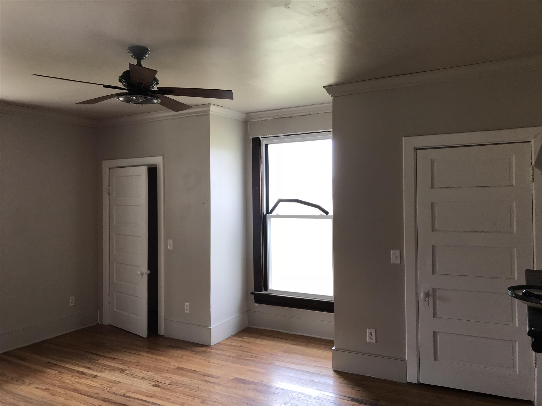 4337 Airport Road Springfield, TN 37172 - Photo 8 of 22 an empty room with wooden floor cabinet and windows