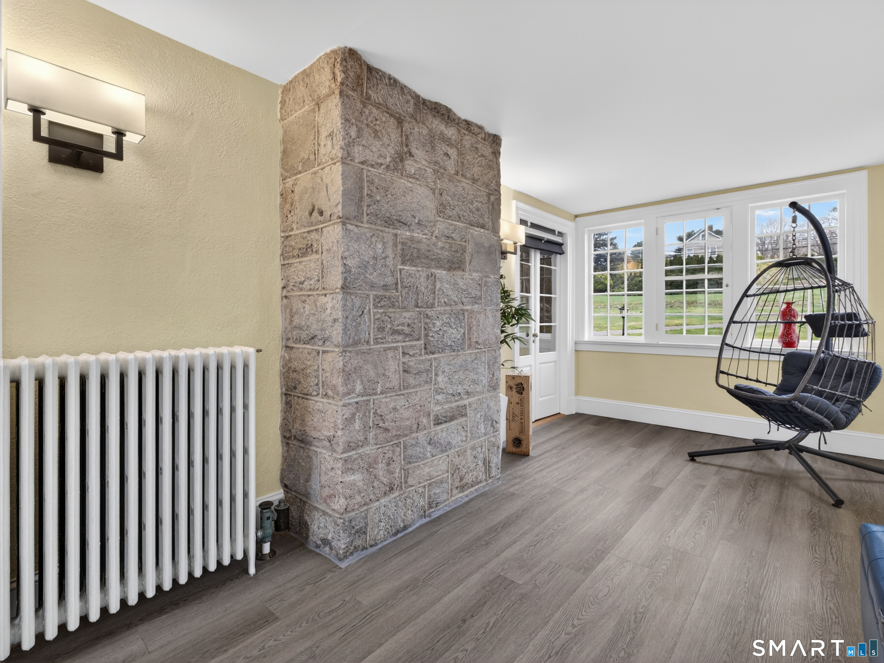 76 Starr Hill Road Groton, CT 06340 - Photo 6 of 40 a view of livingroom with furniture wooden floor and windows