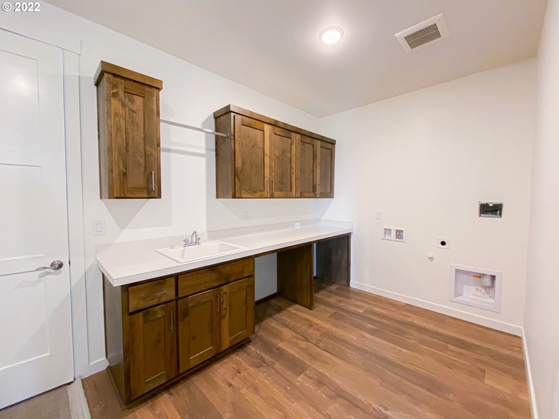 817 South Goose Loop Ridgefield, WA 98642 - Photo 23 of 31 a bathroom with a sink vanity and mirror