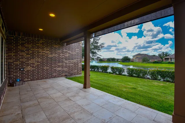a view of a porch with a garden