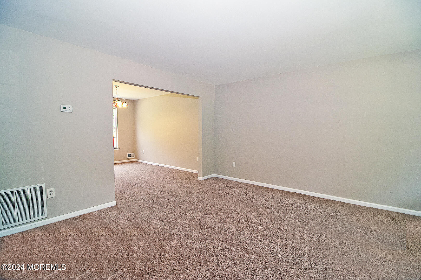 79 Timberline Road Bayville, NJ 08721 - Photo 13 of 40 a view of an empty room and a window