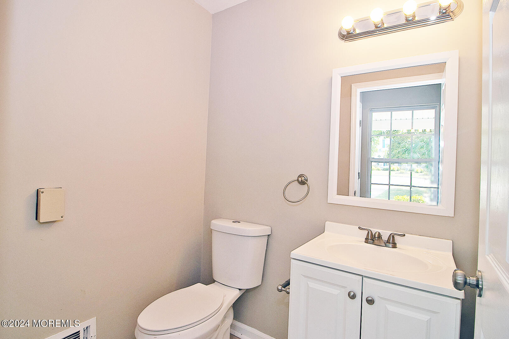 79 Timberline Road Bayville, NJ 08721 - Photo 25 of 40 a bathroom with a sink a toilet and a window