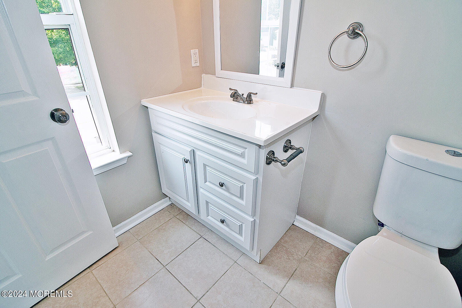 79 Timberline Road Bayville, NJ 08721 - Photo 36 of 40 a bathroom with a sink a toilet and a mirror