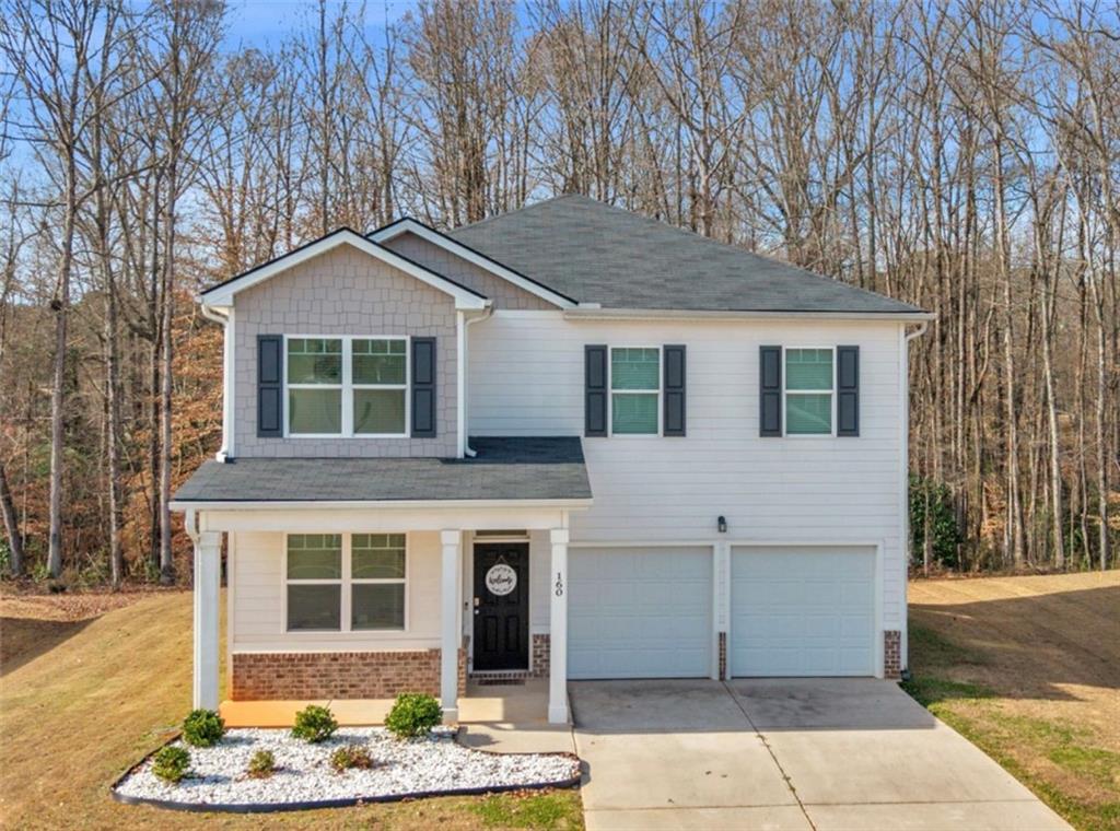 a front view of a house with entertaining space