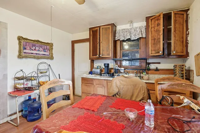 a bed room with a bed and a television