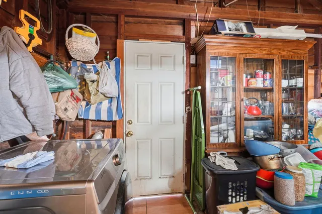 a bathroom with a shower and a mirror