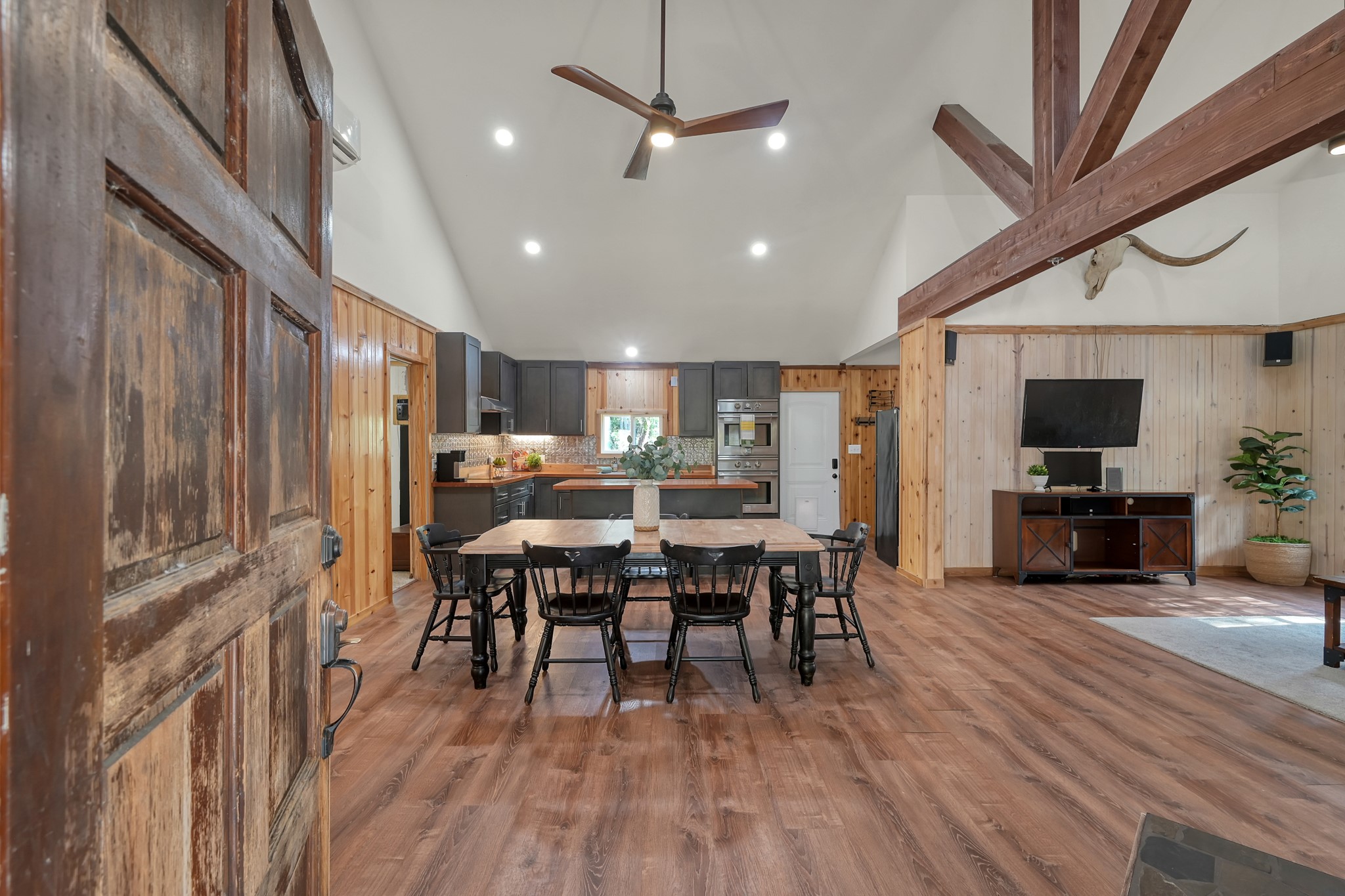 169 Gladys Lane Trinity, TX 75862 - Photo 1 of 25 Come on in! Beautiful open concept and vaulted ceilings with beams.