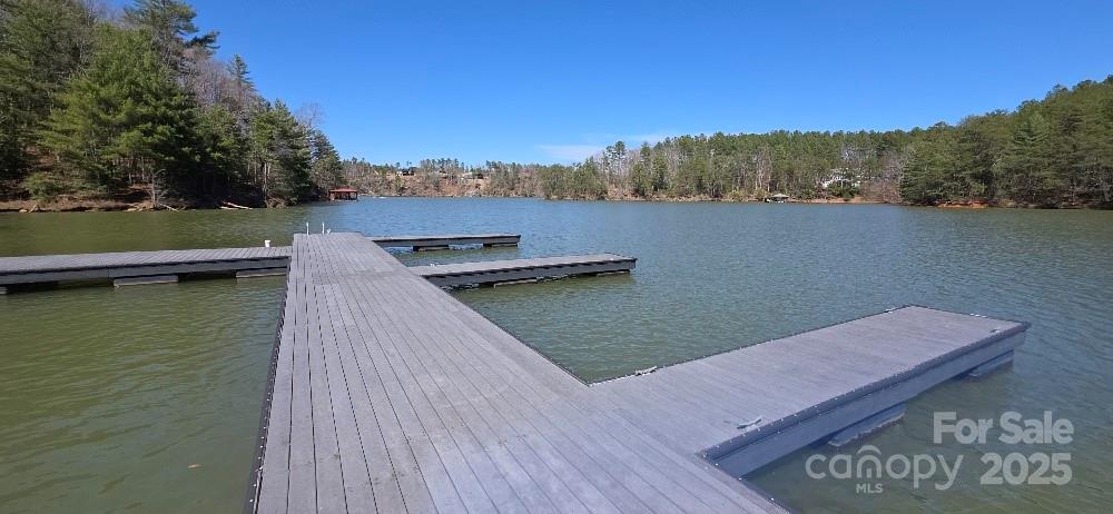 208 Ridge Top Drive Connelly Springs, NC 28612 - Photo 11 of 13 a view of a wooden floor and a lake view