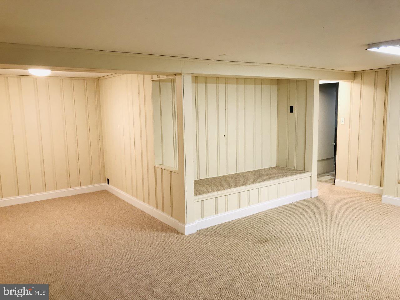7504 Rocksham Drive Baltimore, MD 21286 - Photo 18 of 24 Fully finished basement with brand new carpeting.