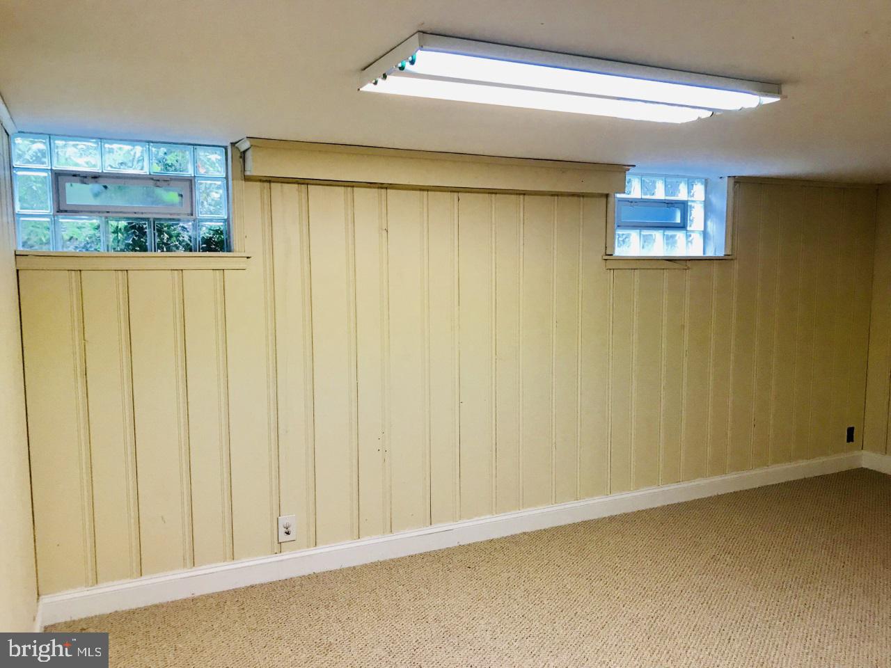 7504 Rocksham Drive Baltimore, MD 21286 - Photo 21 of 24 Basement clubroom.