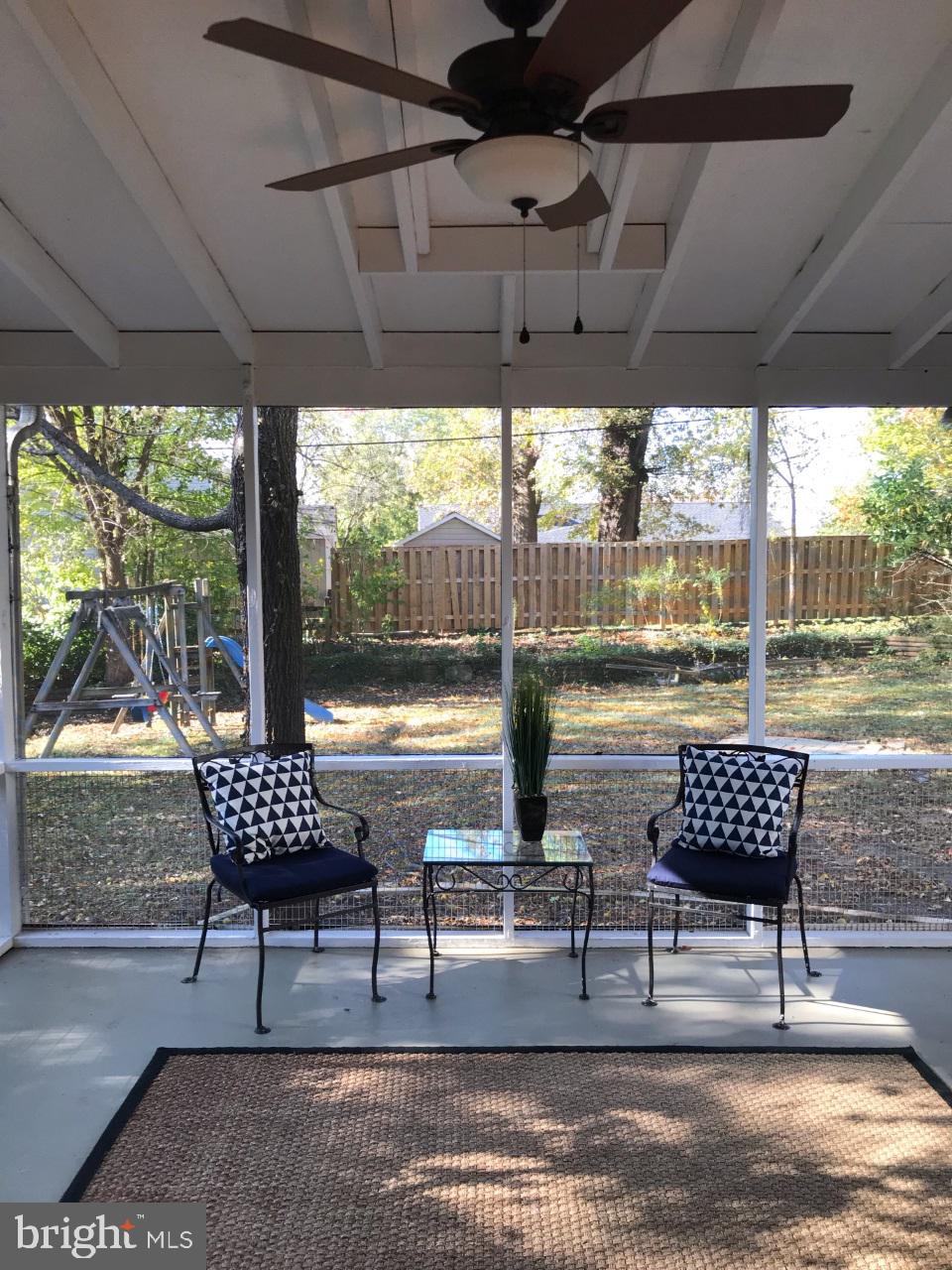 7504 Rocksham Drive Baltimore, MD 21286 - Photo 24 of 24 Comfortable screened porch just off dining room.