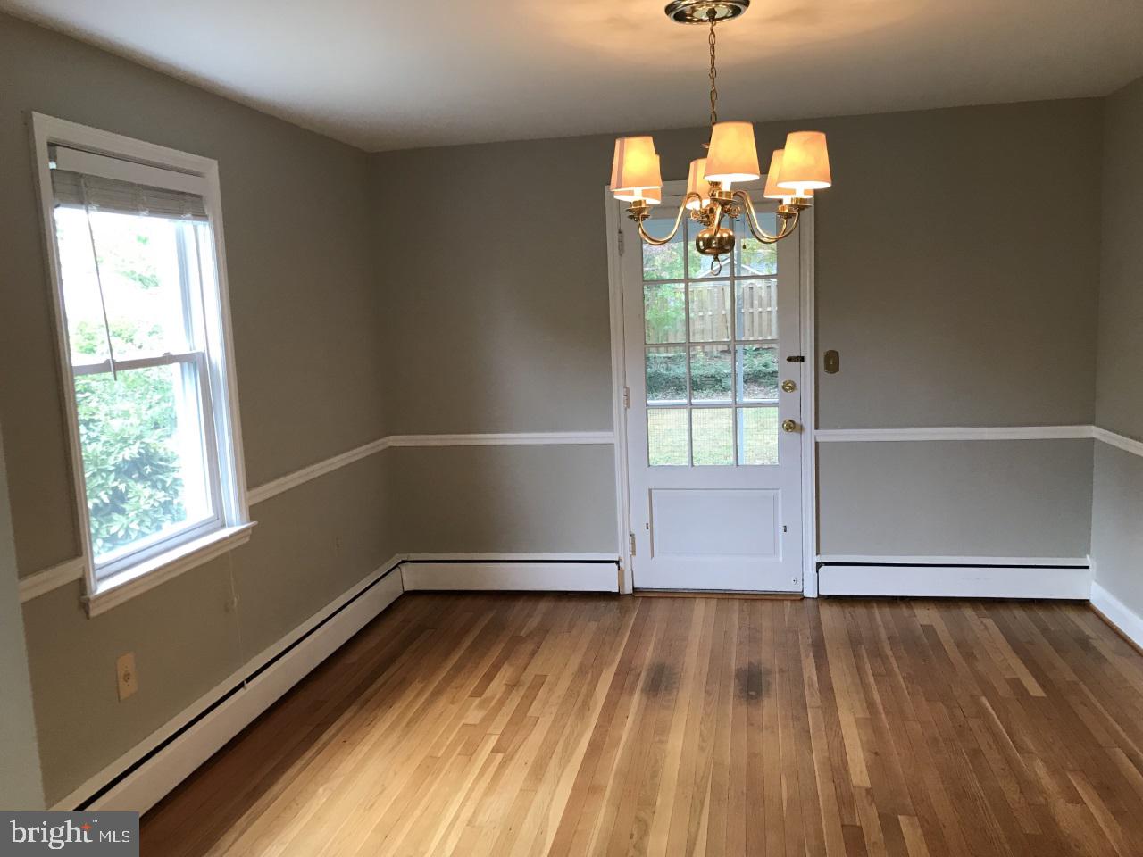 7504 Rocksham Drive Baltimore, MD 21286 - Photo 6 of 24 Dining room with rear access to screened porch.