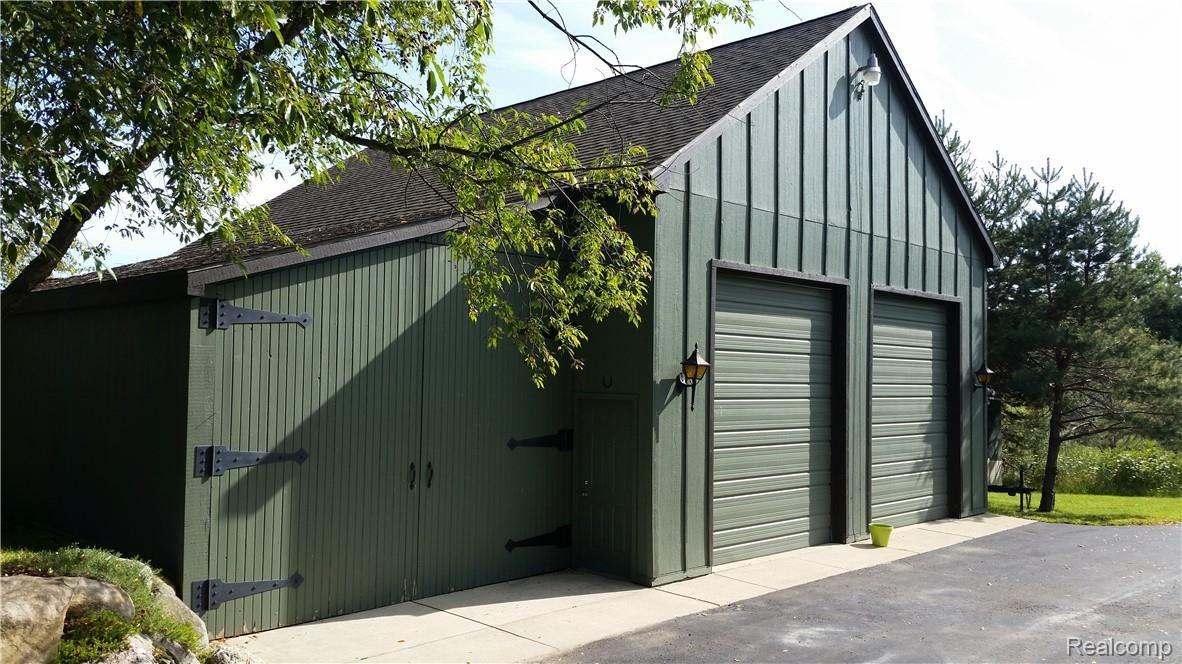 4760 Winding Way Howell, MI 48843 - Photo 48 of 59 40x45 Pole Barn with 15' Ceilings, Loft, Concrete Floor & Electricity