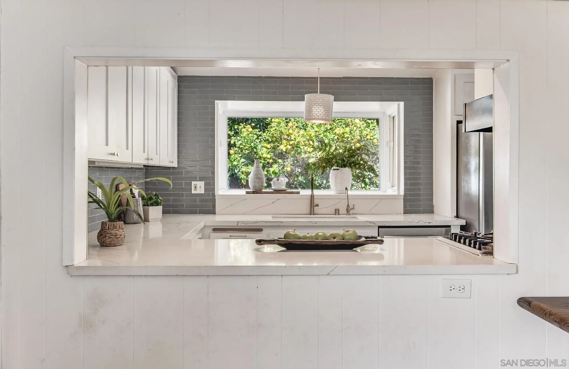 624 8th Street Del Mar, CA 92014 - Photo 11 of 25 a kitchen with a window appliances and cabinets