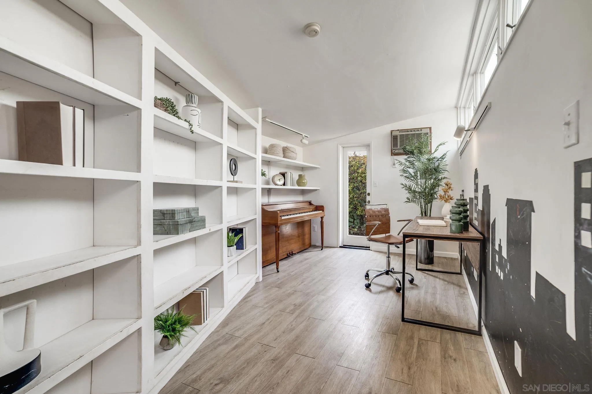 624 8th Street Del Mar, CA 92014 - Photo 13 of 25 a living room with furniture fireplace and wooden floor