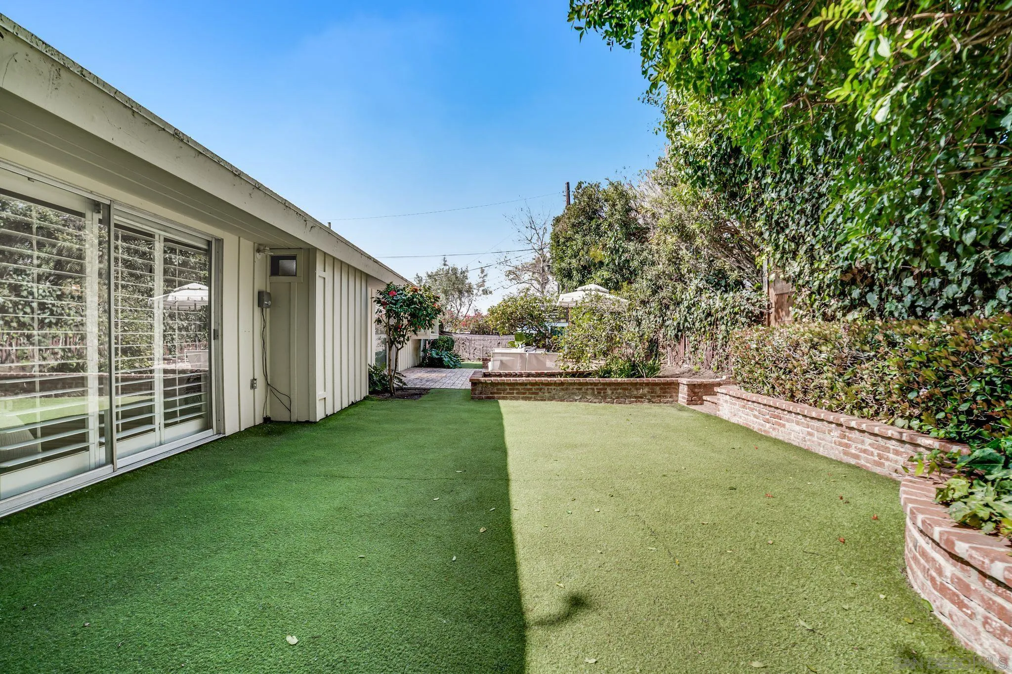 624 8th Street Del Mar, CA 92014 - Photo 18 of 25 a view of a backyard with swimming pool