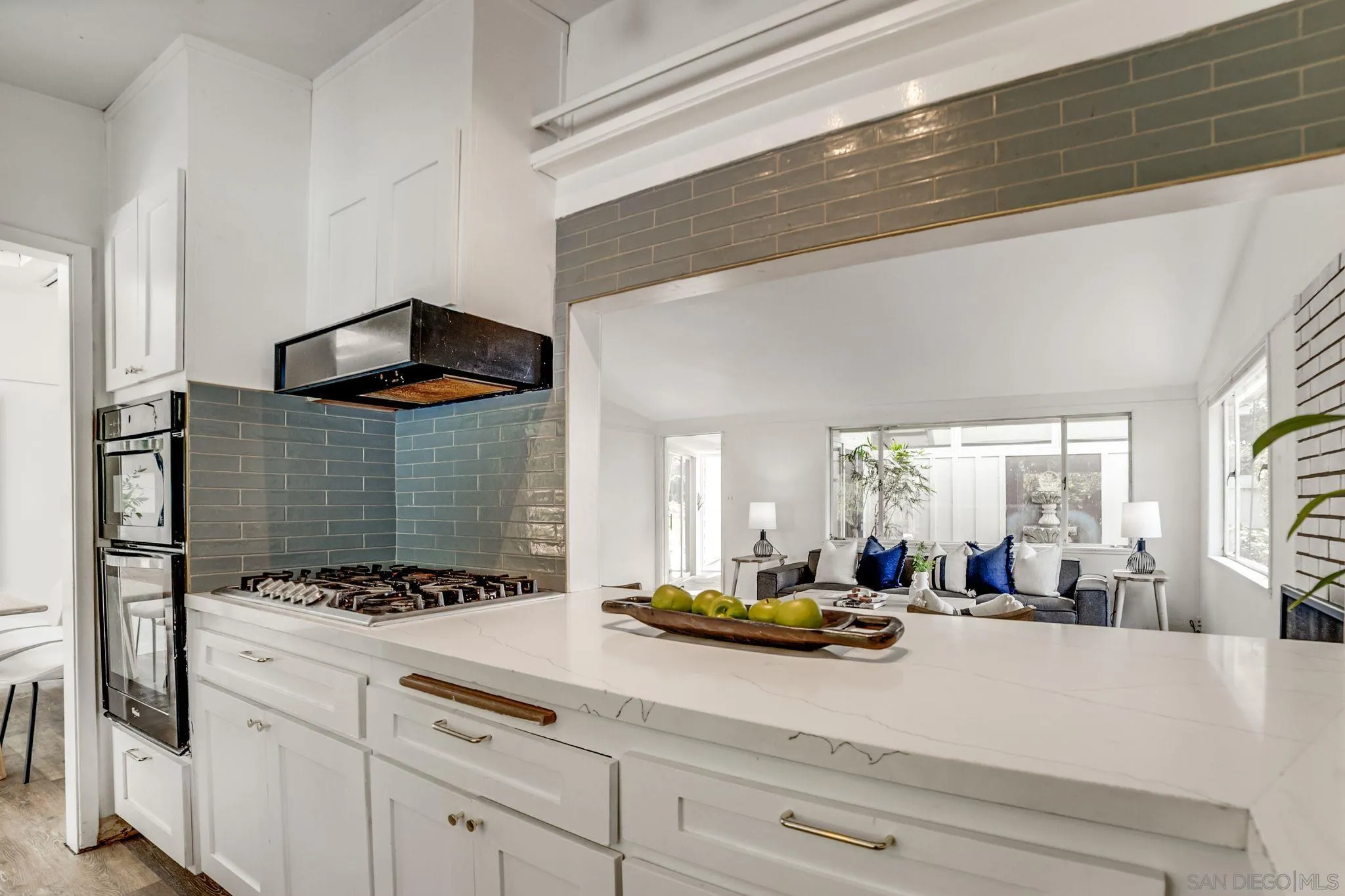 624 8th Street Del Mar, CA 92014 - Photo 2 of 25 a view of a kitchen with a sink and cabinets