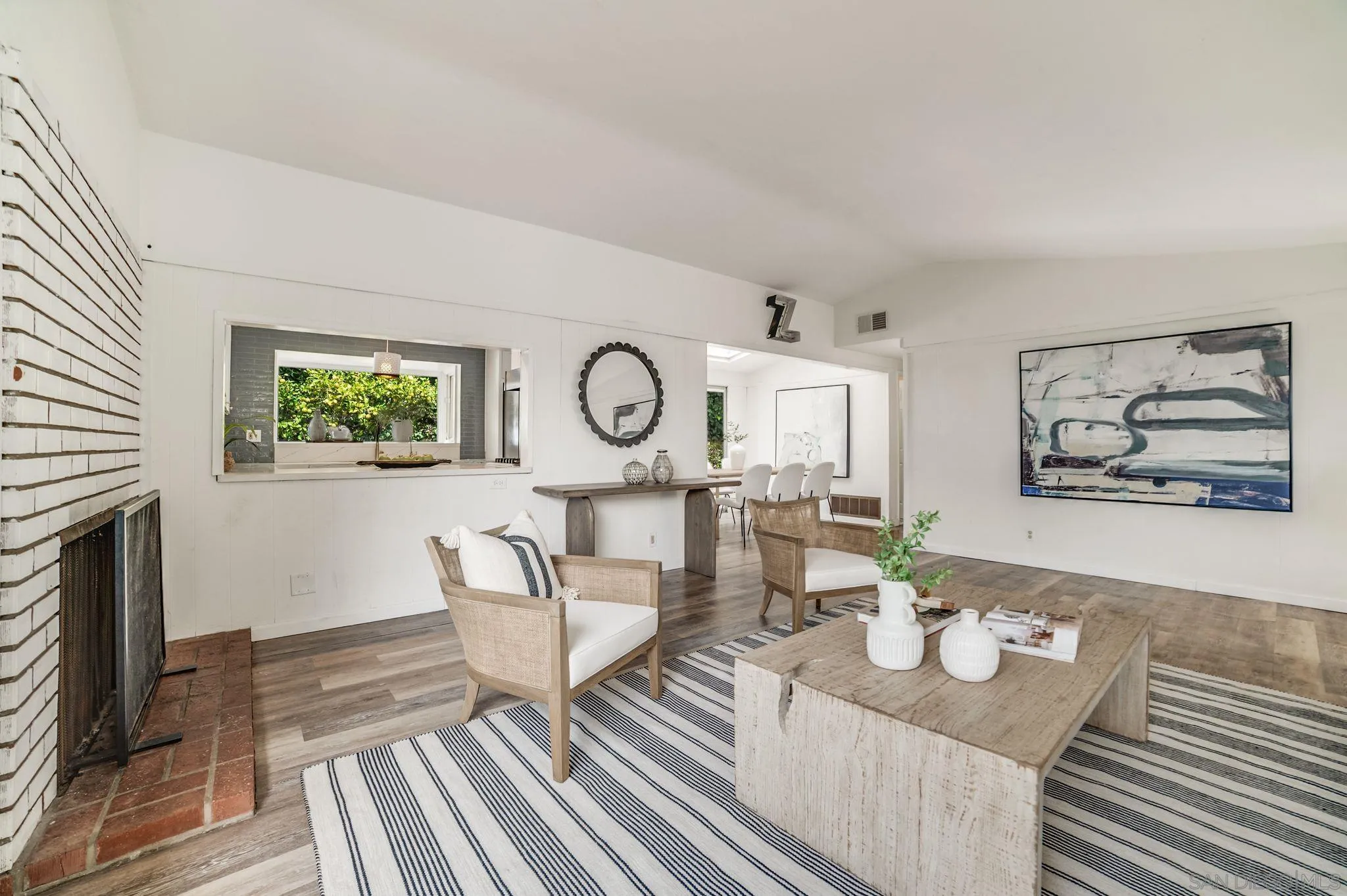 624 8th Street Del Mar, CA 92014 - Photo 6 of 25 a living room with furniture and a fireplace