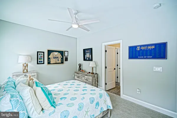 a room with furniture and flat screen tv