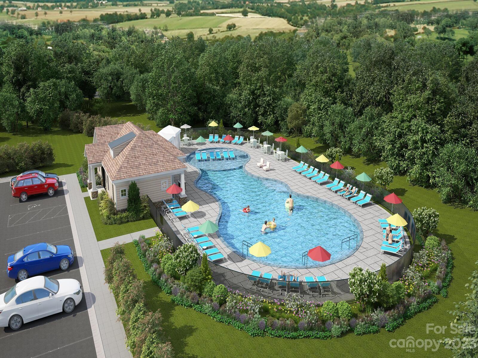 917 Orange Road Monroe, NC 28110 - Photo 4 of 5 a view of a swimming pool with lawn chairs and a table