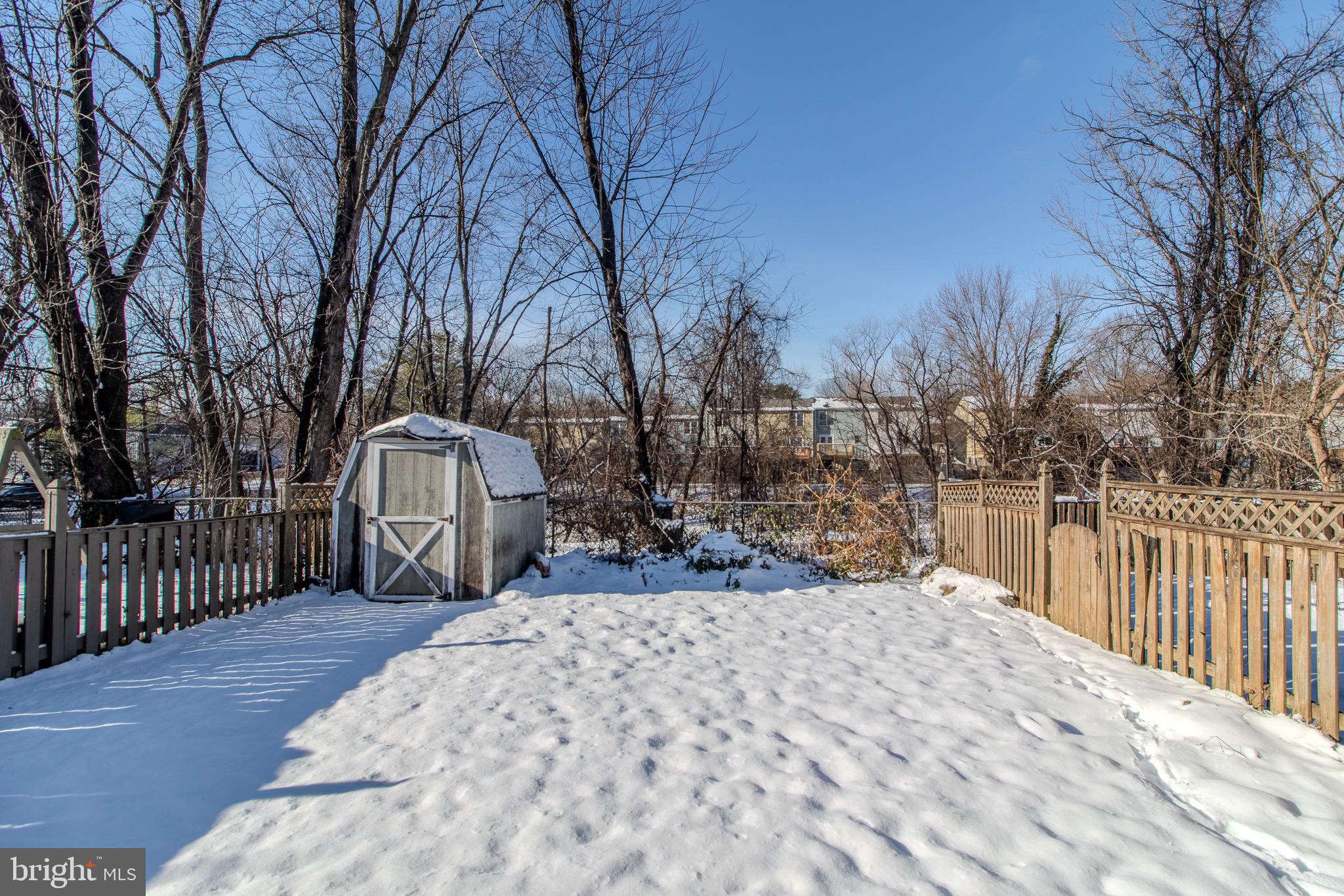 608 St Georges Station Road Reisterstown, MD 21136 - Photo 26 of 30 a view of a backyard with wooden fence