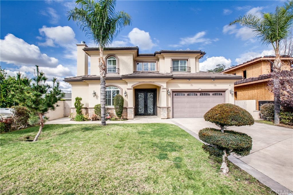 a house view with a garden space
