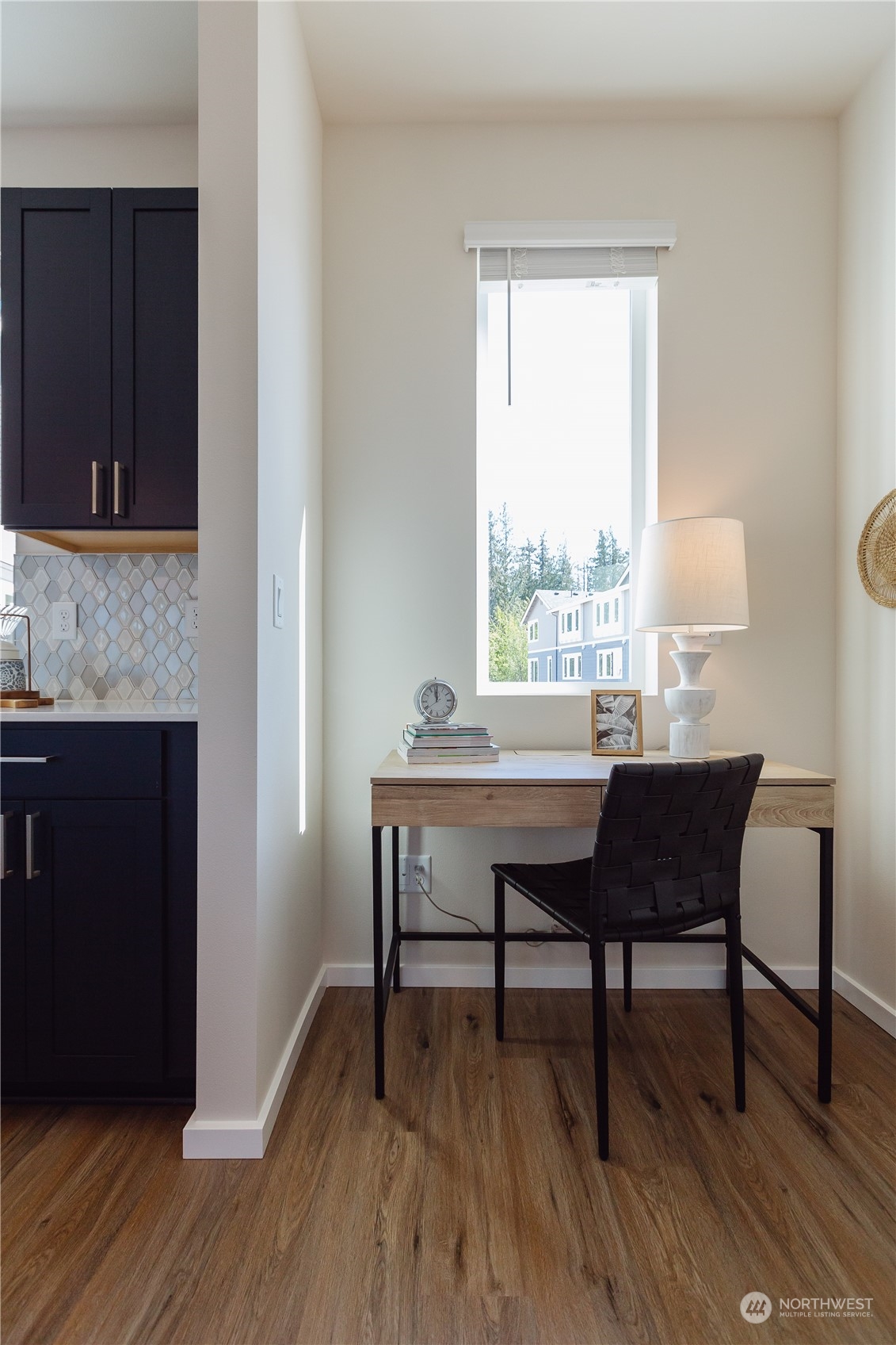 4226 148th Street Southeast, Unit C1 Bothell, WA 98012 - Photo 13 of 24 a view of a workspace with furniture and a window