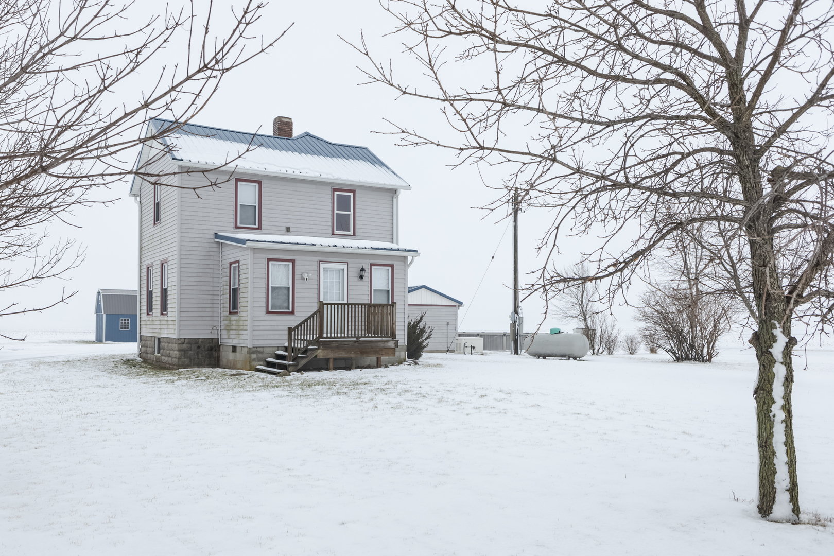 a view of a house with snow on the house