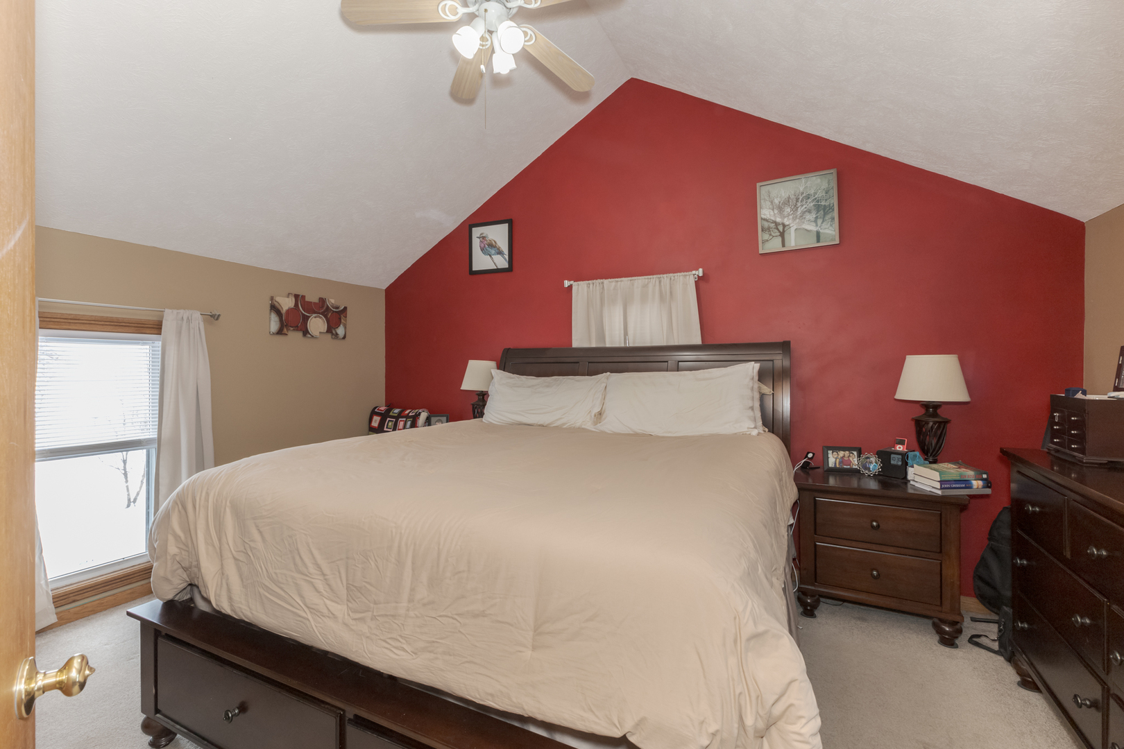 9948 North 100 E Road Gridley, IL 61744 - Photo 19 of 27 a bedroom with a bed and a chandelier