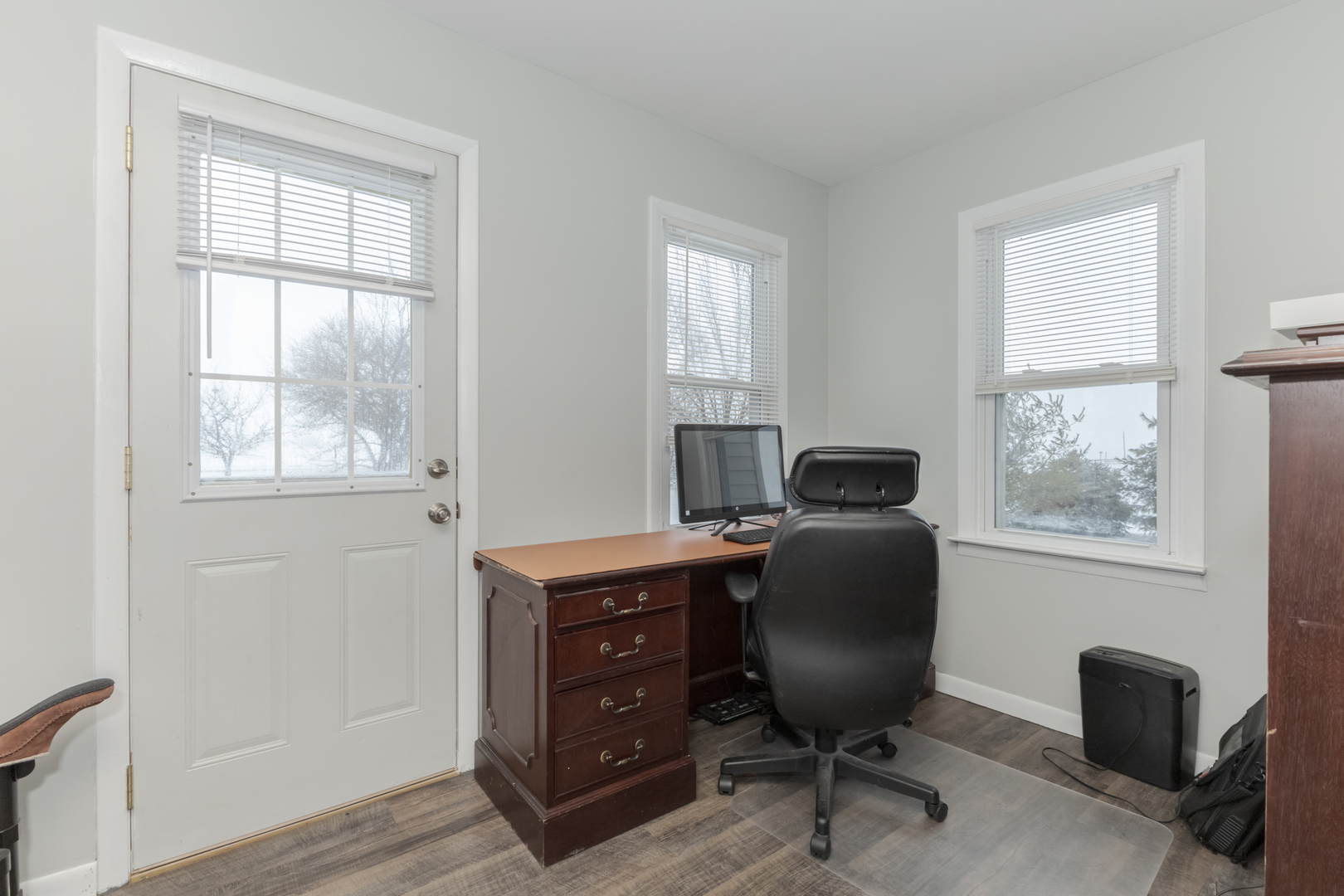 9948 North 100 E Road Gridley, IL 61744 - Photo 2 of 27 a view of a workspace with furniture and a window