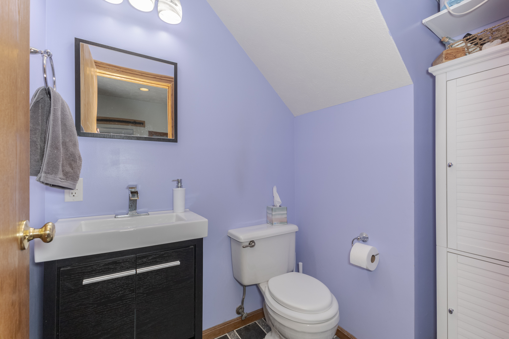 9948 North 100 E Road Gridley, IL 61744 - Photo 6 of 27 a bathroom with a sink vanity mirror and toilet