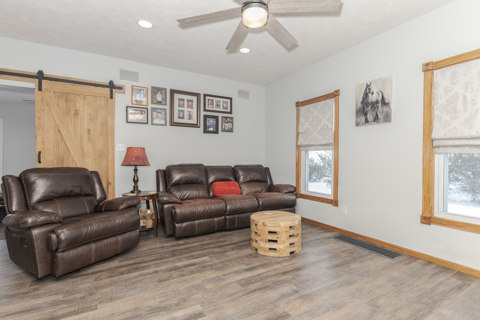 9948 North 100 E Road Gridley, IL 61744 - Photo 8 of 27 a living room with furniture and a window