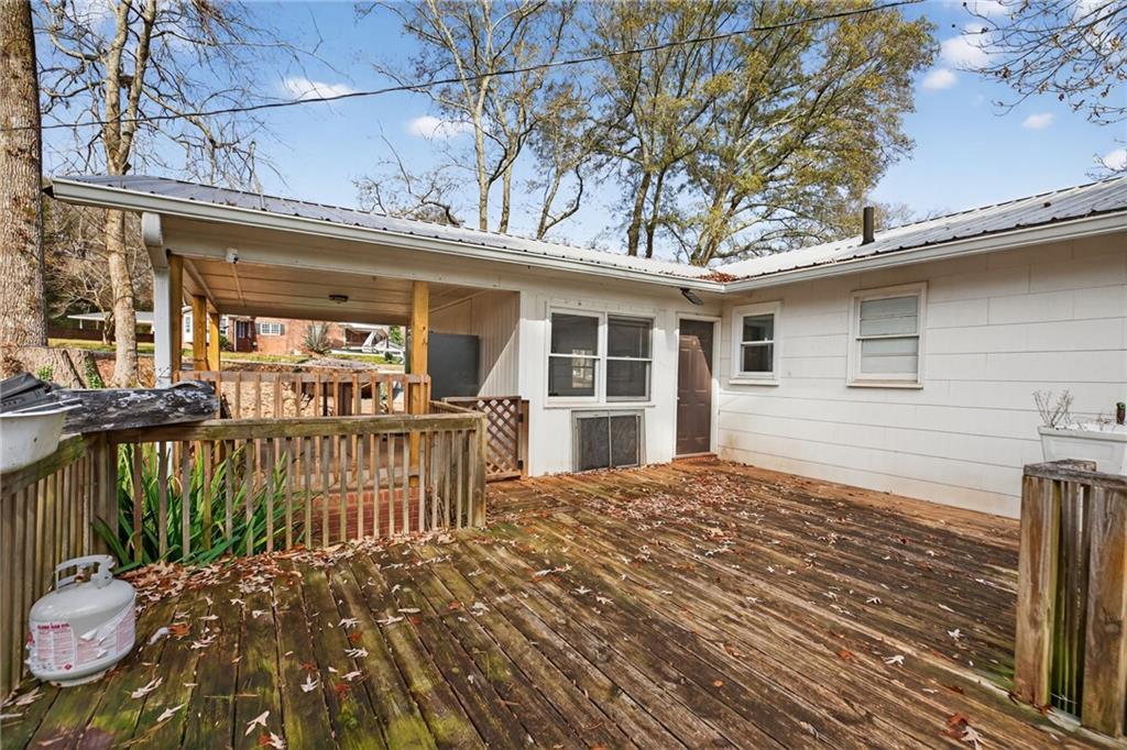 113 Maple Street Bremen, GA 30110 - Photo 18 of 23 a view of a house with wooden floor next to a house