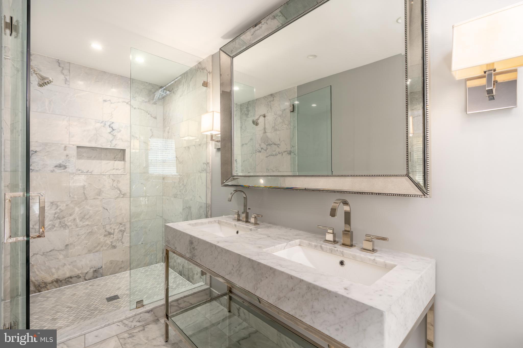 4920 Palisade Lane Northwest Washington, DC 20016 - Photo 28 of 70 Elegant marble primary bathroom