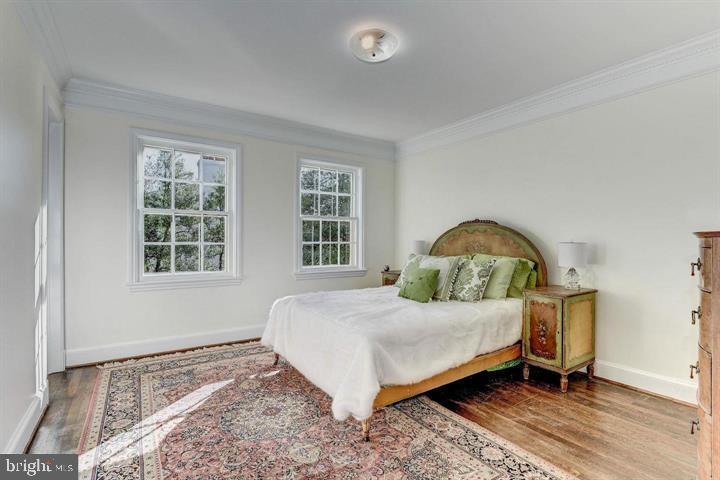 4920 Palisade Lane Northwest Washington, DC 20016 - Photo 36 of 70 Serene bedroom with natural light and charm